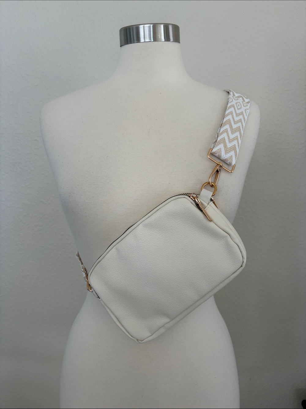 Cream Crossbody Sling Bag with Chevron Strap and Gold Hardware
